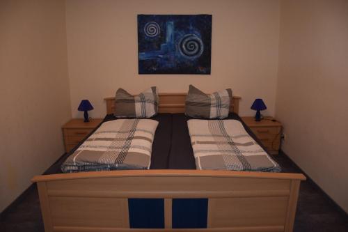 Кровать или кровати в номере Ferienwohnung Bergblick