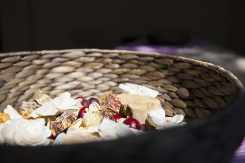 a wicker basket filled with different types of food at Hotel Boutique Casa Fernanda in Tepoztlán