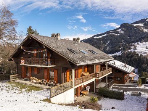 a log home in the mountains with snow at Apartment Brocard by Interhome in Val dʼIlliez