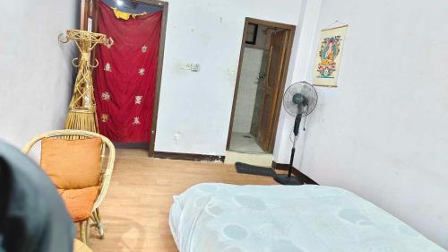 Un ou plusieurs lits dans un hébergement de l'établissement Monkey Temple Homestay