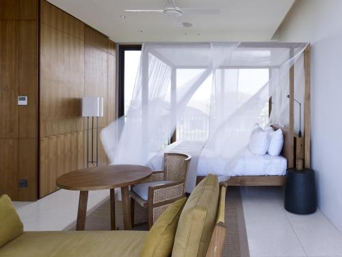 Posteľ alebo postele v izbe v ubytovaní Arnalaya Beach House
