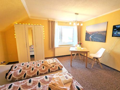 Postel nebo postele na pokoji v ubytování L6 - Urlaubsmagie Sofort loswandern - Kirnitzschtal