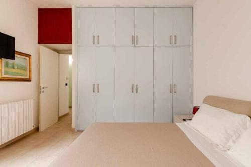 Postel nebo postele na pokoji v ubytování Camelia Apartment