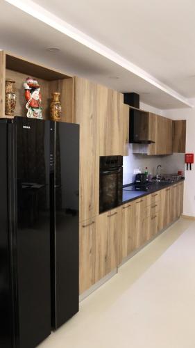 SC6 - Modern & Spacious 2 Bed tesisinde mutfak veya mini mutfak