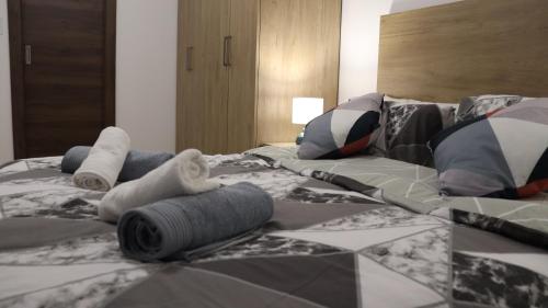 Llit o llits en una habitació de SC6 - Modern & Spacious 2 Bed