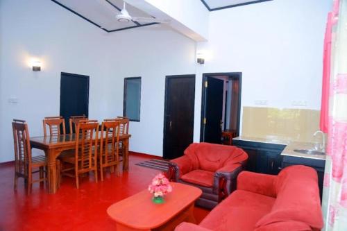 Posezení v ubytování Sunflower House Weligama