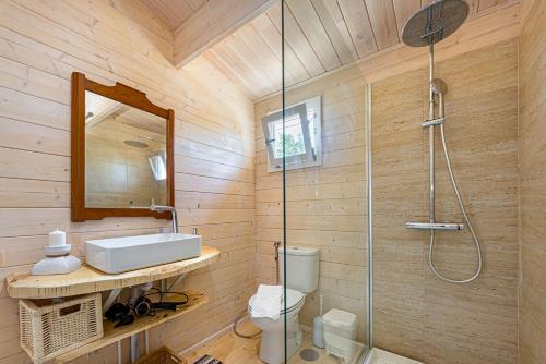 a bathroom with a sink and a shower at Design Chalet in Albufeira With Private Pool in Albufeira