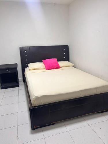 En eller flere senge i et værelse på Posada Francelly