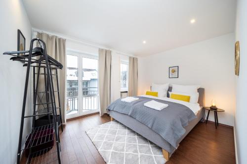 Postel nebo postele na pokoji v ubytování LaDolceVita - 100m2 Apartment in Zentraler Lage
