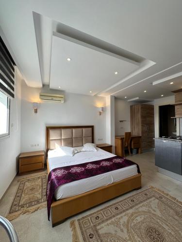 Llit o llits en una habitació de Immeuble Gazbar