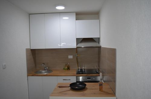 Kuchyň nebo kuchyňský kout v ubytování Stan Dobrinja 1-4 Jahorina/Bjelašnica za 20ak min