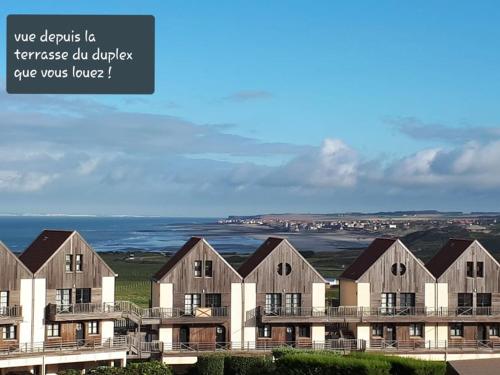 a rendering of an apartment building with the words we describe ie franchise oil duplex at RÉSIDENCE LA NATURELLE Duplex in Wimereux