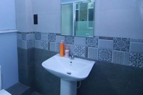 Bathroom sa Blooming Holiday Resort
