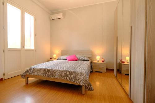 Giường trong phòng chung tại Lady 2 - Pineto Vacanza