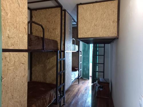 a room with bunk beds in a house at MAMBE HOSTEL in Bogotá