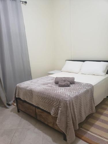 Ein Bett oder Betten in einem Zimmer der Unterkunft Noud Villa