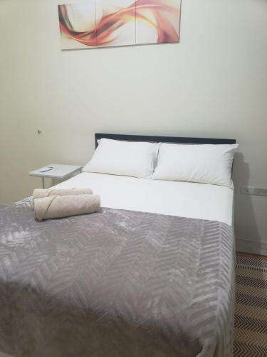 Ein Bett oder Betten in einem Zimmer der Unterkunft Noud Villa