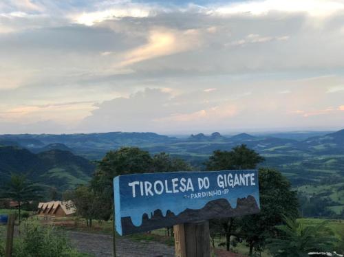 a sign that reads trucias do grote at Chalés do Gigante in Pardinho