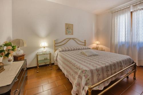 Postel nebo postele na pokoji v ubytování Appartamento Sole d'Estate