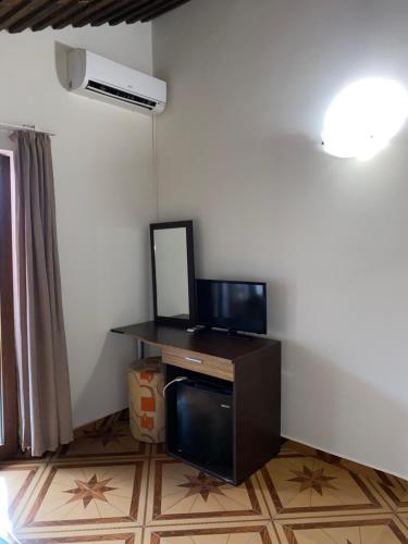 TV/trung tâm giải trí tại Guest Rooms Wild Duck