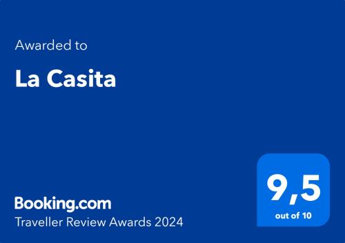 niebieski ekran z tekstem przyznanym nagrodom la casita Traveler w obiekcie La Casita w mieście Brendola