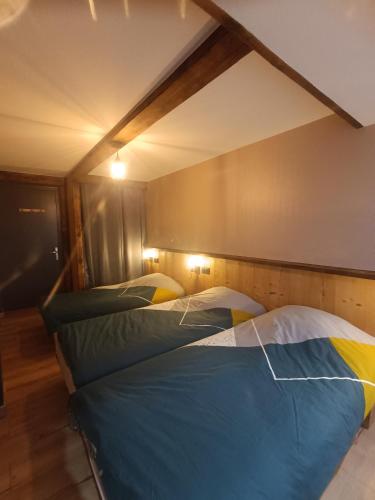 Cama o camas de una habitación en Chambre Les étoiles de Bevy