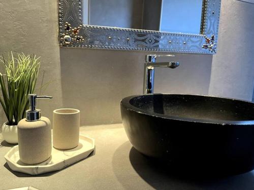 Koupelna v ubytování L'Atypique d'Orléans