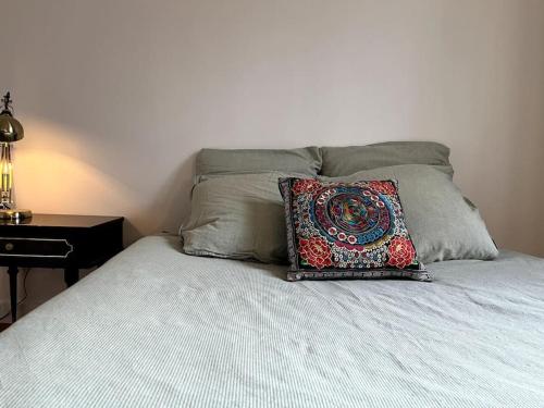 Postel nebo postele na pokoji v ubytování L'Atypique d'Orléans