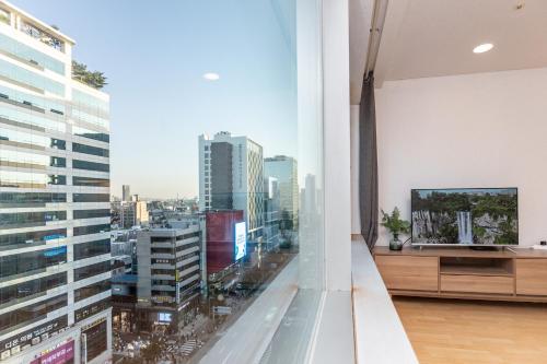 ein Apartment mit Stadtblick in der Unterkunft Jiny's Cozy Room in Seoul