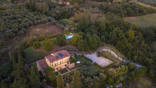 an aerial view of a house in the woods at Casa Lucchese al Borghetto in Collodi