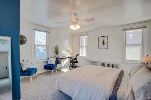a bedroom with a bed and a table and chairs at Charming Pottstown Apartment - Walk to Town! in Pottstown