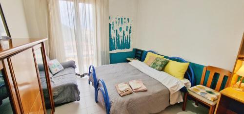 Ένα ή περισσότερα κρεβάτια σε δωμάτιο στο Vicino di Centro e Universita Stanza con balcone