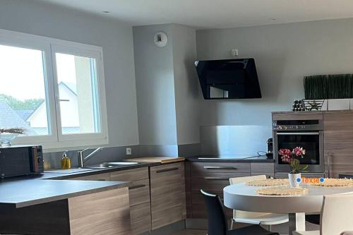 Kuchyň nebo kuchyňský kout v ubytování Accès direct plage 100m