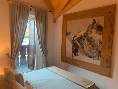 En eller flere senge i et værelse på Chez nous