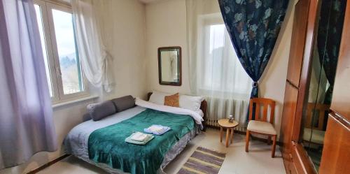a small bedroom with a bed and a window at Monstera room Vicino al centro in Perugia