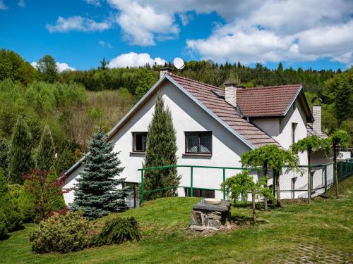 a white house with a red roof at Holiday Home Malovidy by Interhome in Rataje nad Sázavou