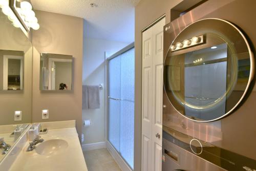 a bathroom with a sink and a mirror at Holmes Beach - Mangroves 3607 #208 in Holmes Beach