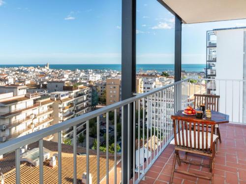 a balcony with a view of a city at Apartment Cortijo Barques by Interhome in Sitges