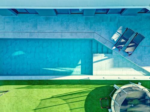 Bazén v ubytování Villa Villa Icaro by Interhome nebo v jeho okolí