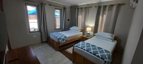 Una cama o camas en una habitación de SEMEREL APARTMENT