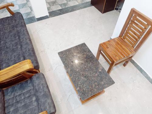 an overhead view of a table and chairs at Skylight Residency Yercaud in Yercaud