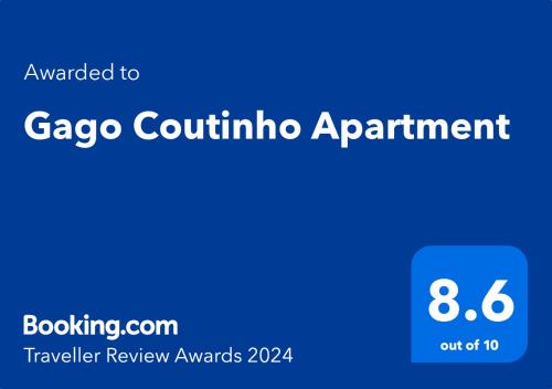 um sinal azul com as palavras gaga nomeação contínua em Gago Coutinho Apartment em São Jacinto