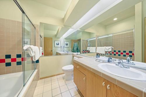 a bathroom with a sink and a toilet and a shower at Studio #250 in Olympic Valley