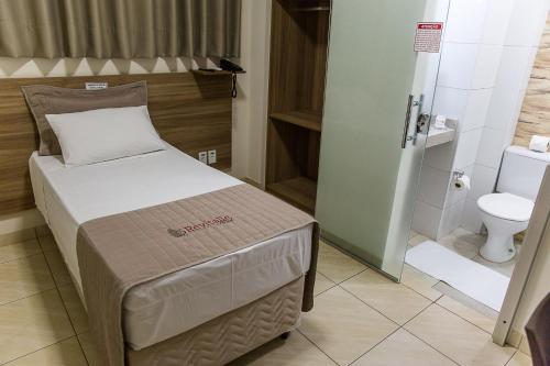 Posteľ alebo postele v izbe v ubytovaní Revitalle Hotel