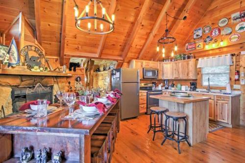 a large kitchen with a large island in a cabin at Majestic View Hideaway in Sevierville