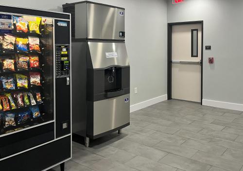 a large refrigerator and freezer in a store at Motel 6 Gonzales, LA Baton Rouge Geismar Prairieville I 10 in Gonzales