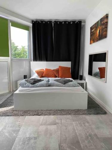 Säng eller sängar i ett rum på Dortmund City! Apartment DREAM