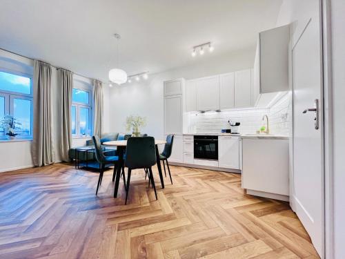 Η κουζίνα ή μικρή κουζίνα στο Apartamenty Kamienica Centrum - 1 Maja