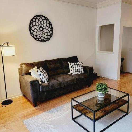 a living room with a couch and a coffee table at Fantastic 1-Bedroom Close to Reliant Stadium & Medical Center in Houston