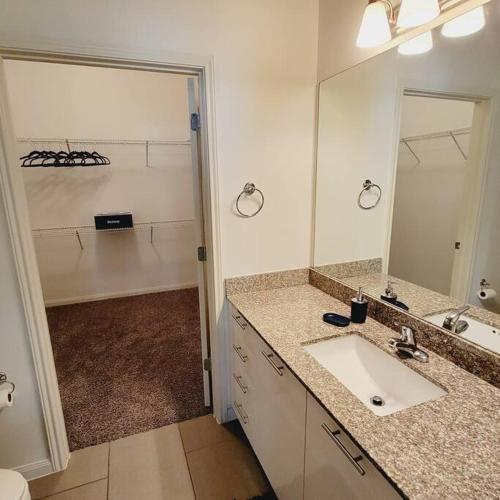 a bathroom with a sink and a mirror at Fantastic 1-Bedroom Close to Reliant Stadium & Medical Center in Houston